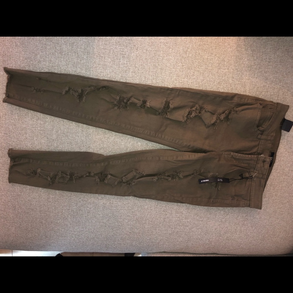 Olive colored distressed crop jeans